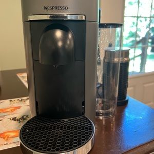 Nespresso vertuo plus coffee machine with automatic hot and cold frother